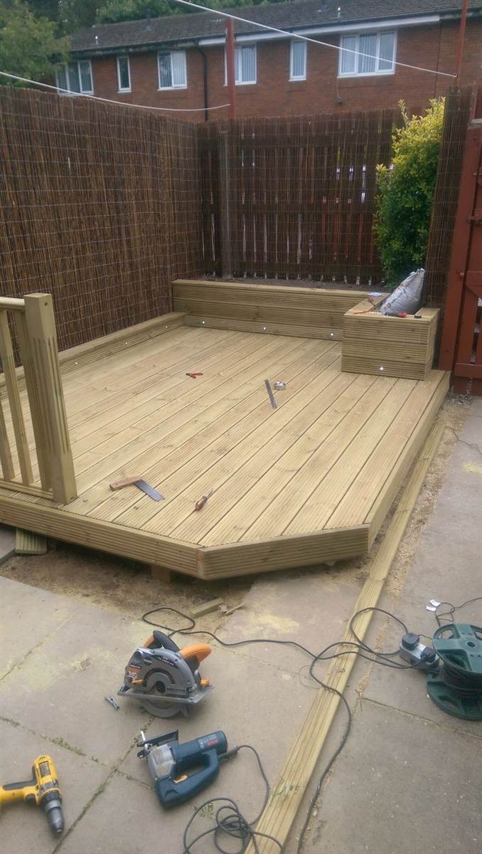 After — finished deck with balustrade, raised planters and privacy screening